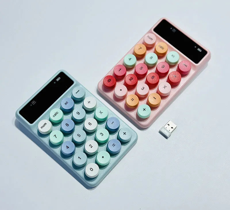 Mini portable wireless keyboard showing macaron colour options on ABS plastic construction