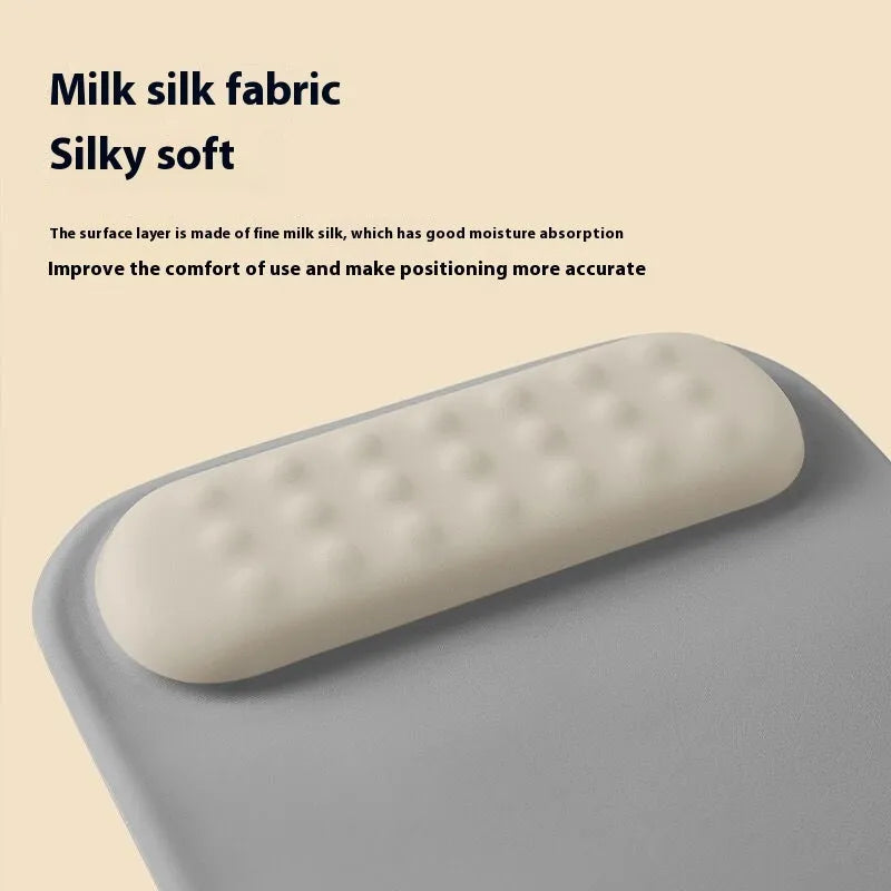 Ergonomic cloth silicone mouse pad with wrist rest in multiple colour options.