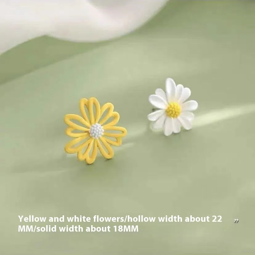 Three pairs of alloy flower earrings in blue-orange, white-green, and yellow-white colour combinations