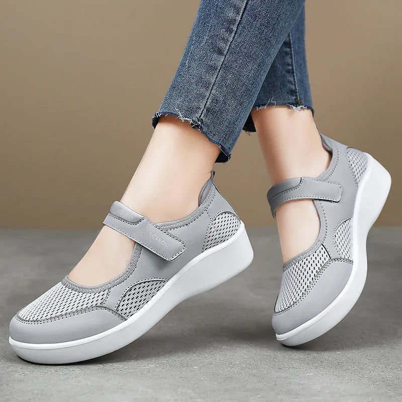 Women's breathable mesh casual shoes with Velcro closure in black, gray, pink, and red colours
