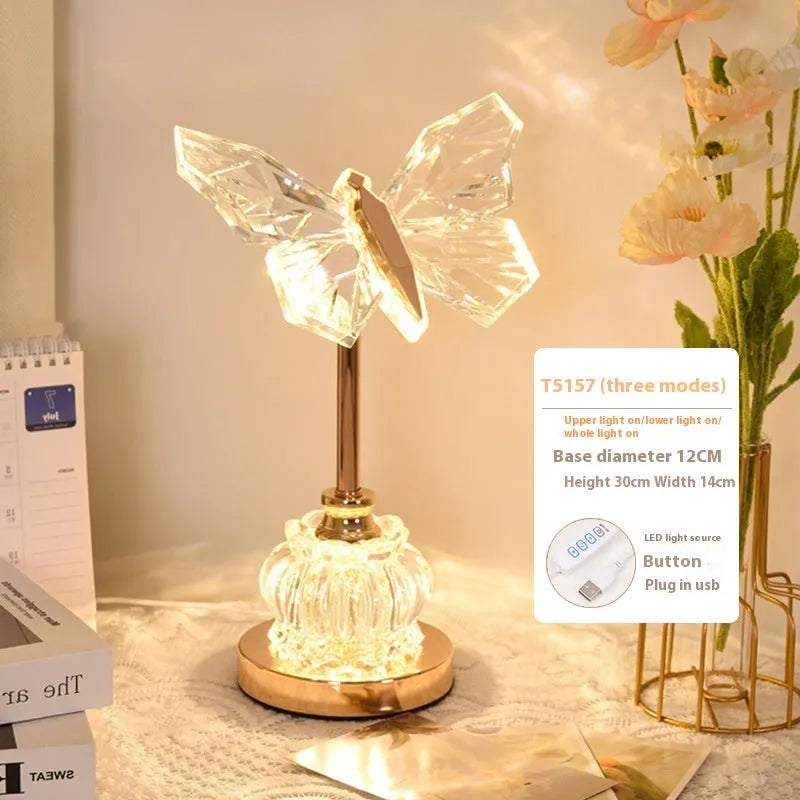 Butterfly table lamp with adjustable brightness and angle in a bedroom setting with USB plug-in