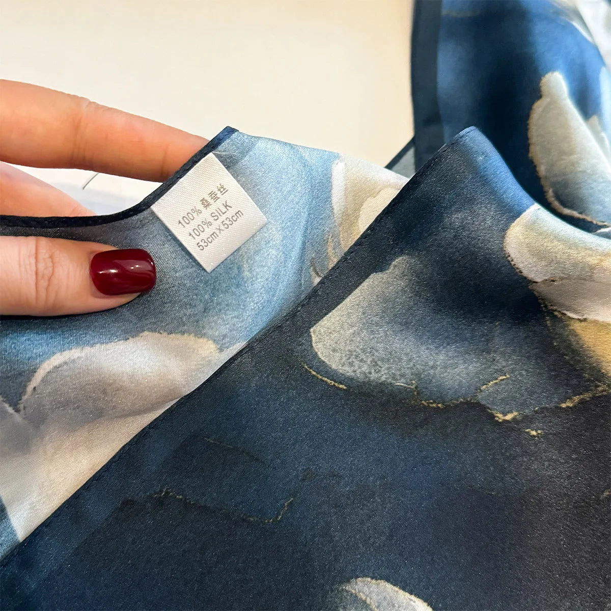 Blue mulberry silk square scarf with tie-dye pattern, 53x53cm, worn as neck wrap