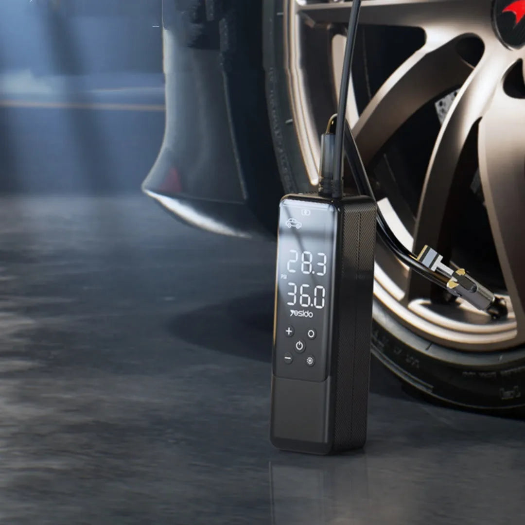 Portable 12V car tyre inflator pump in black with LED light and pressure gauge, model VC05