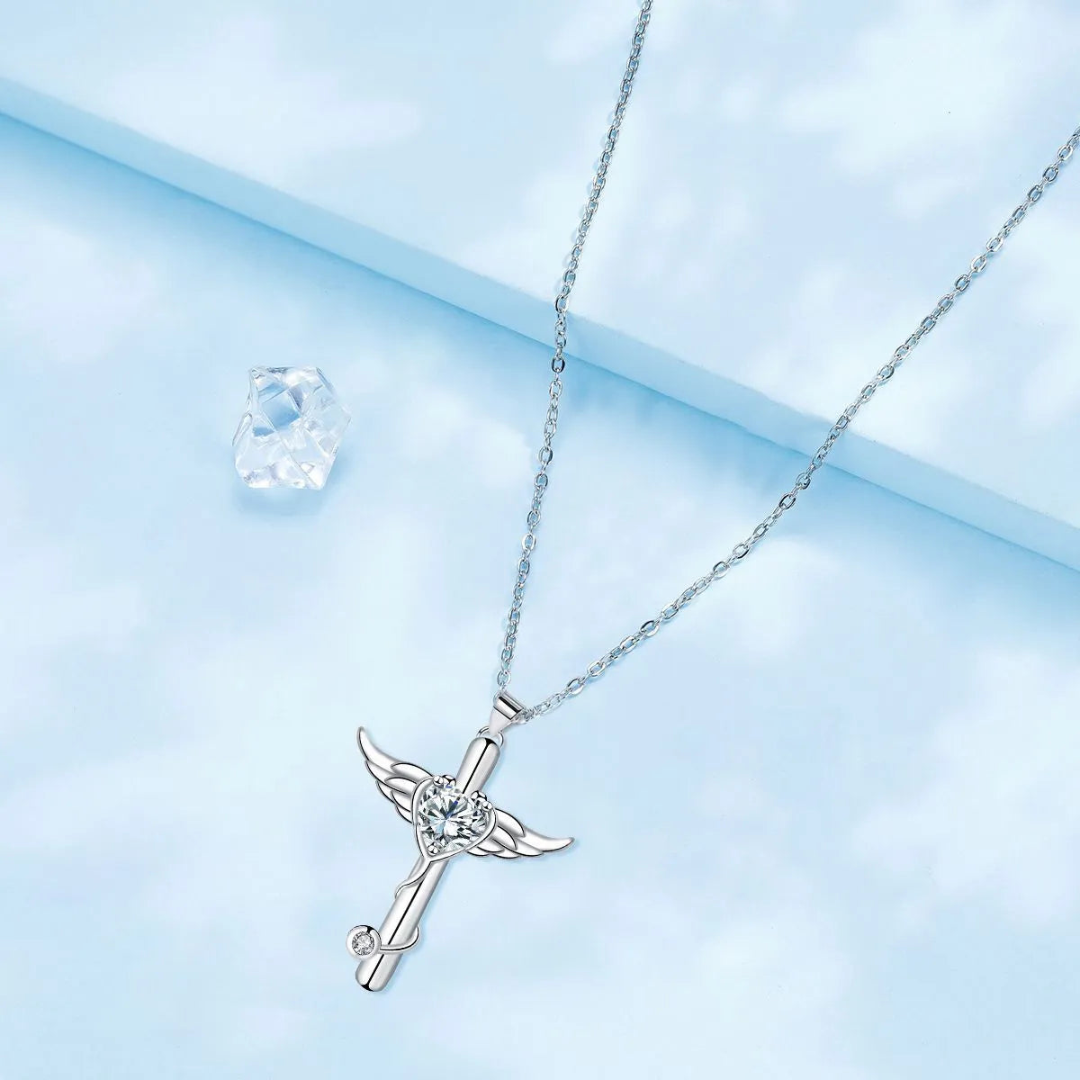 Women's copper wings cross stethoscope necklace with electroplated finish in red diamond colour option
