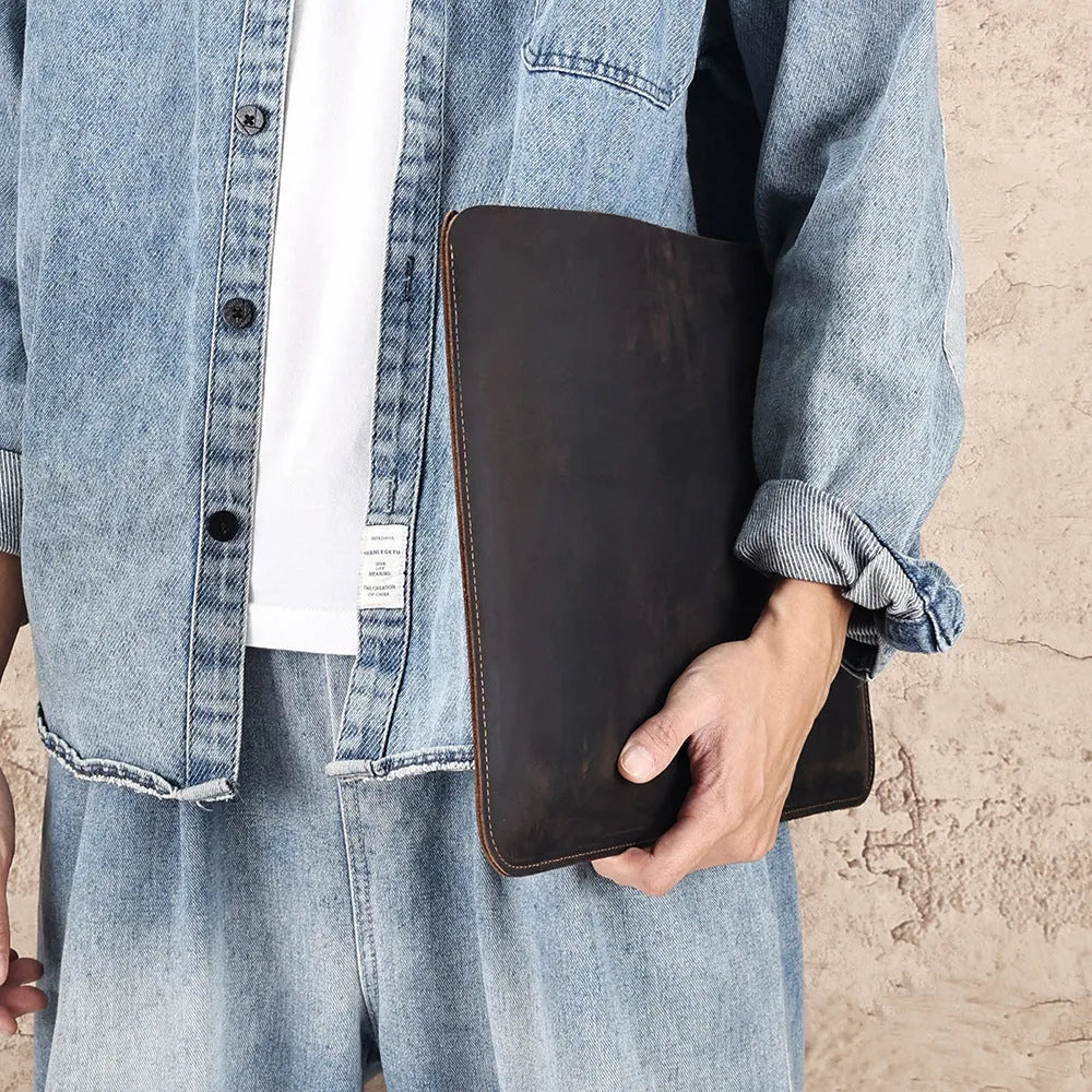 Crazy Horse leather horizontal computer liner bag in brown showing first layer cowhide construction