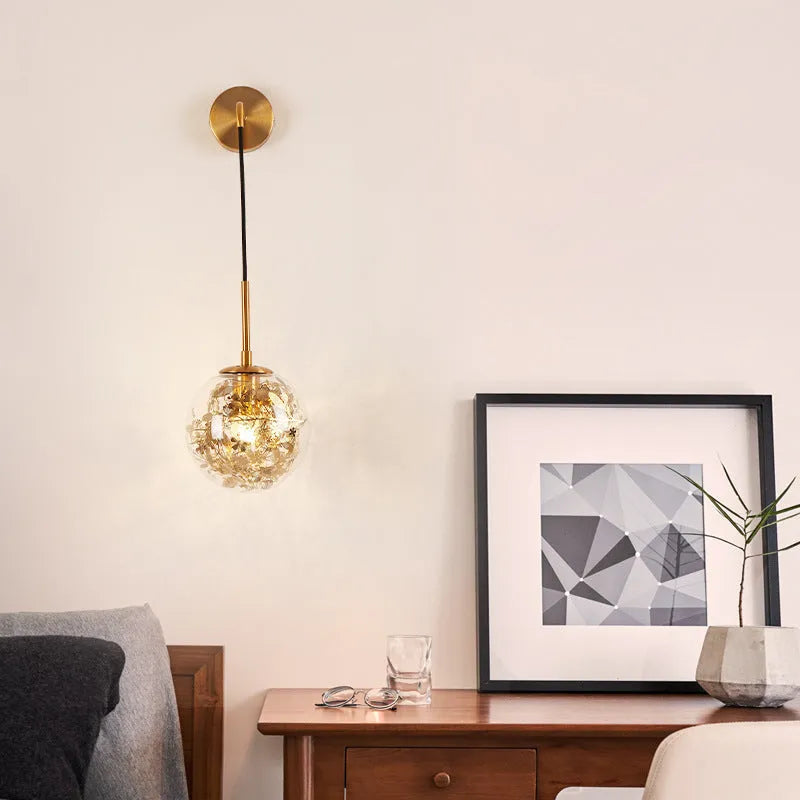 Modern glass bedside wall lamp in golden flower or silver flower finish