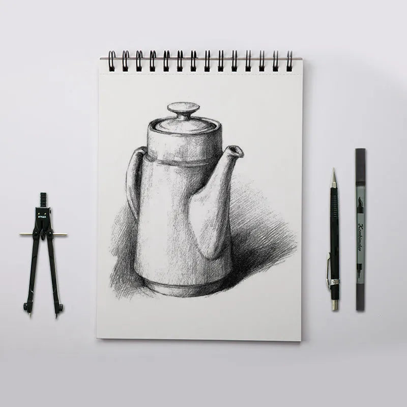 A4 format sketchbook with coil binding and open pages, showing heavy-weight drawing paper.