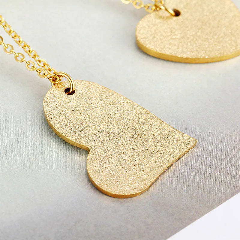 Geometric heart-shaped titanium steel pendant necklace on a 50 cm chain, colour KN25736-Z.
