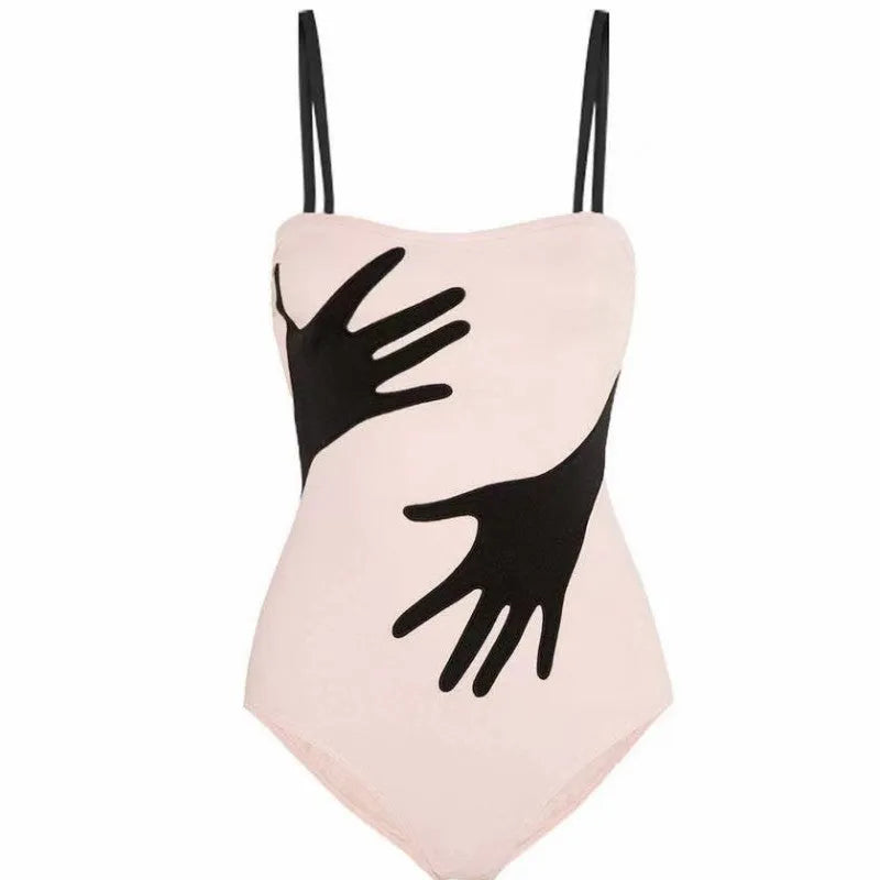 Women's one-piece bikini swimsuit with a gauze skirt overlay in one-piece bikini colour.