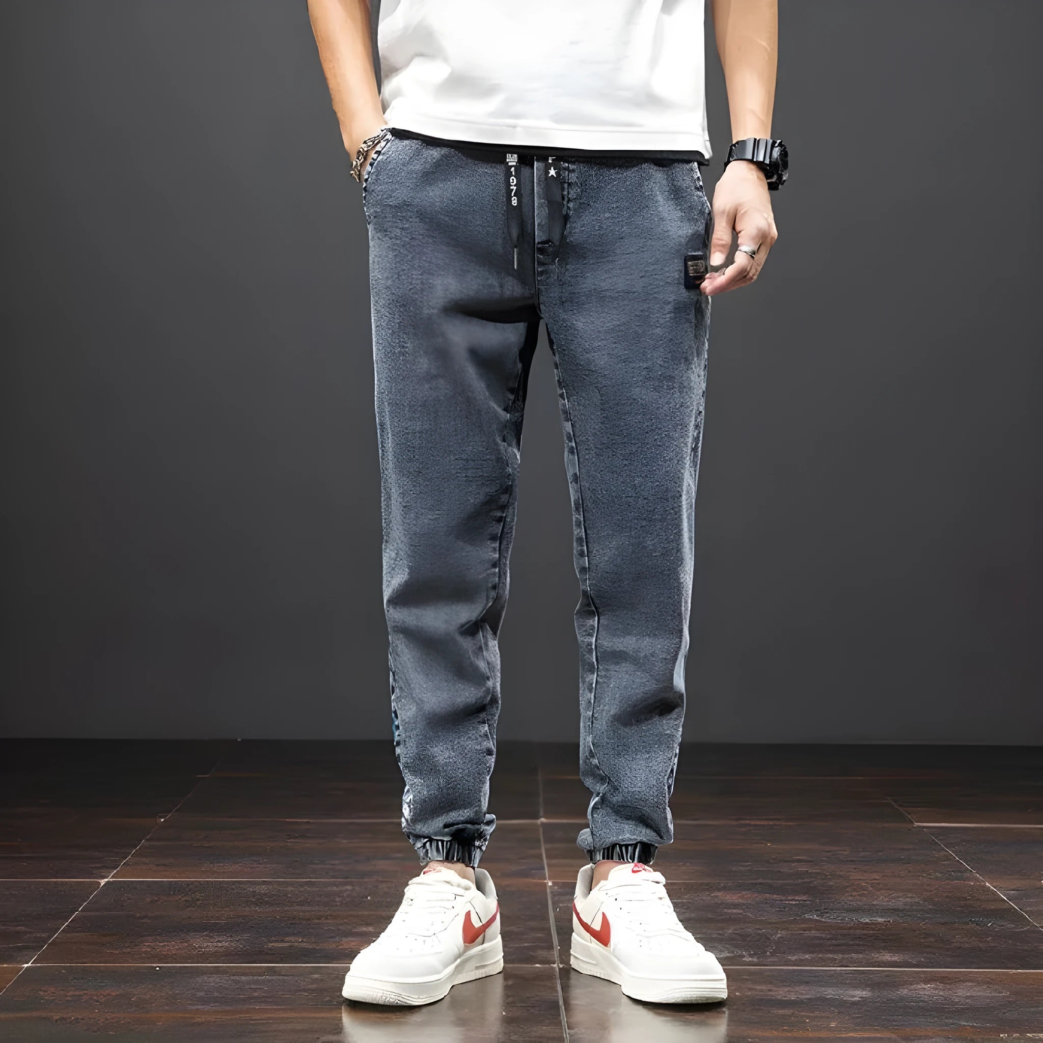 Men's casual loose stretch cotton jeans in black, available in sizes M to 8XL for relaxed daily wear