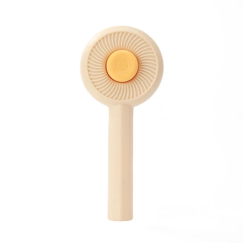 Blue self-cleaning pet grooming brush with angled metal needles and massage particles