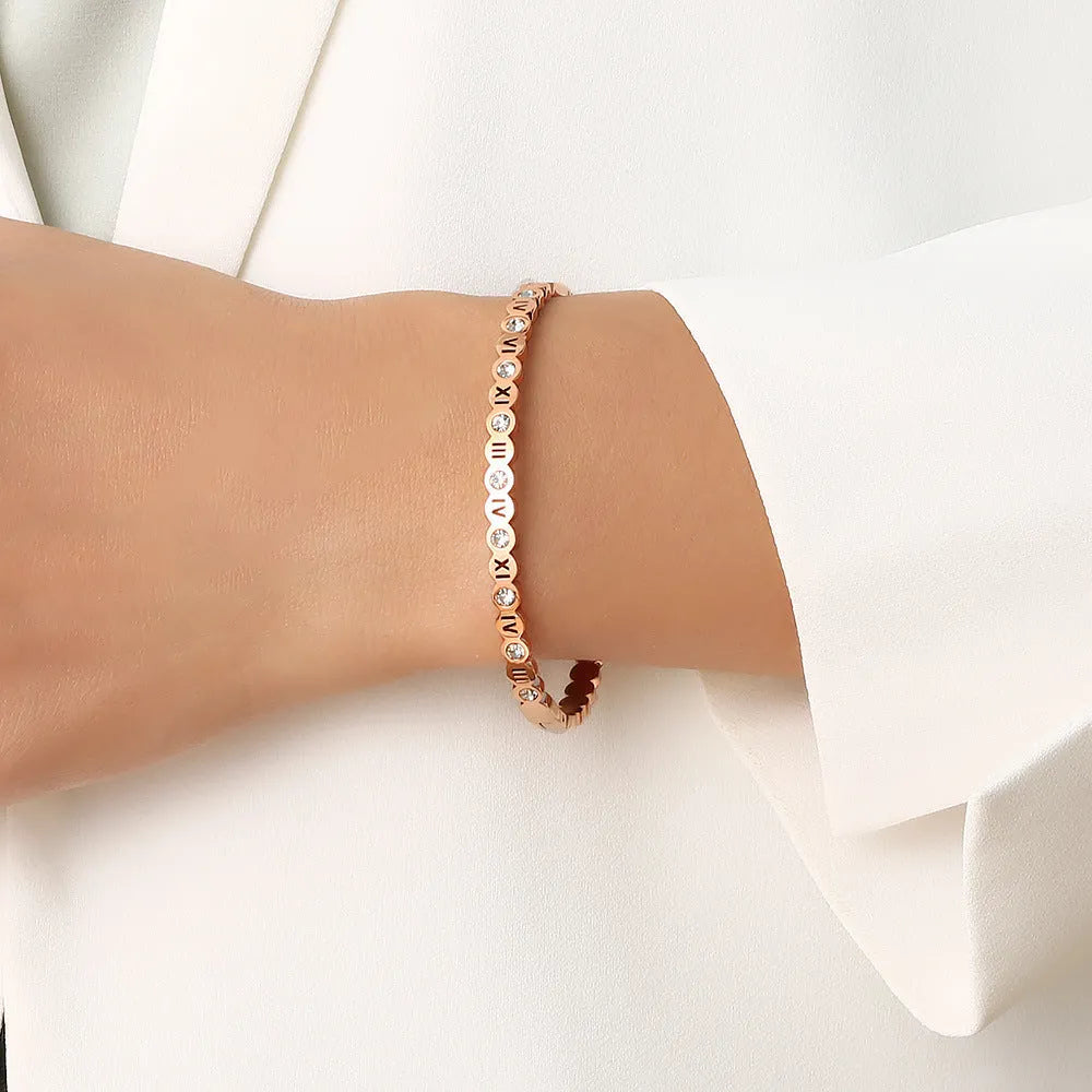 Titanium steel bracelet with electroplated gold rose gold steel finishes and numbered Korean style design