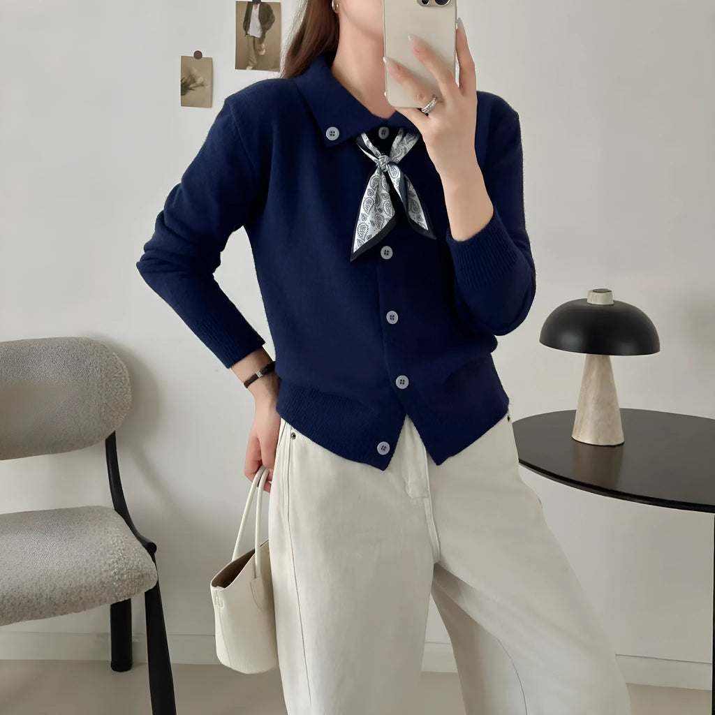 Ladies' grey lapel scarf cardigan sweater on a hanger