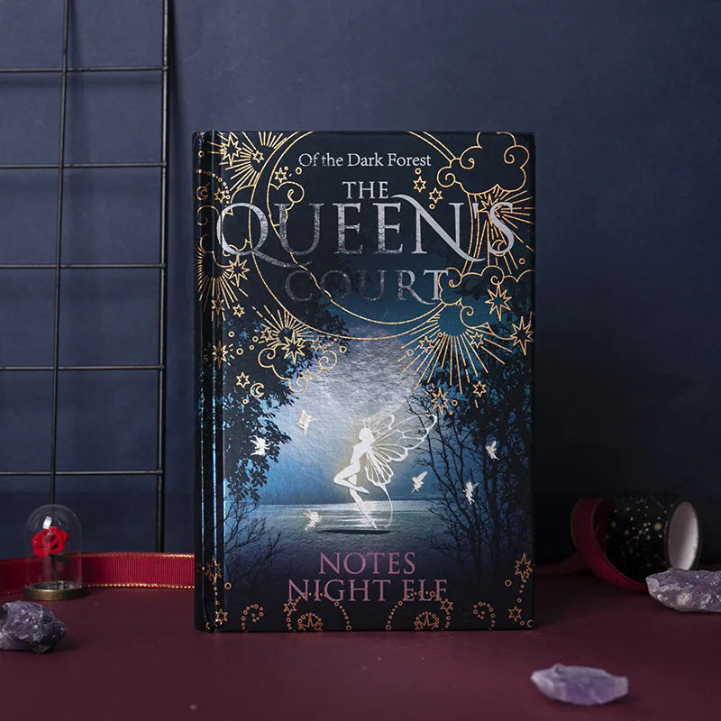 Blue and Purple luminous hardcover A5 notebooks open to show full-colour Night Elves illustrated pages.