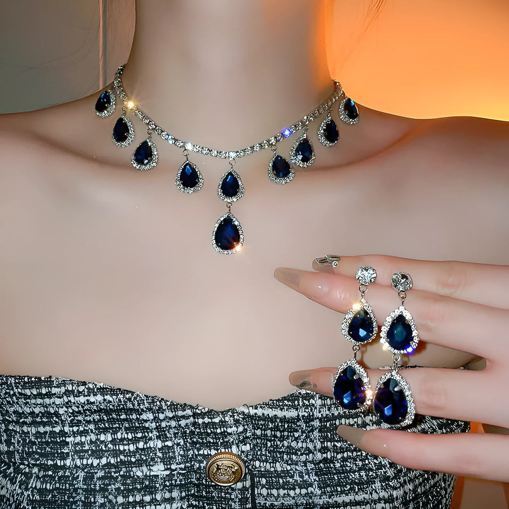Silver needle water drop earrings and necklace set with blue zircon pendant on clavicle chain court style