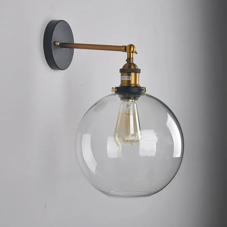 20cm round retro glass ball wall lamp in amber, smoke grey, or transparent finish with aluminium holder.