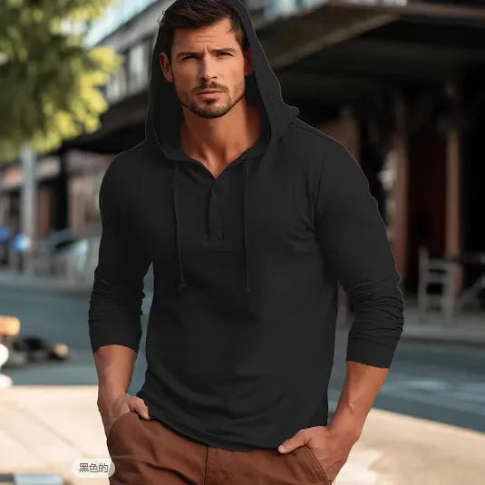 Man wearing a dark blue cotton pullover hoodie with long sleeves, showing front view.