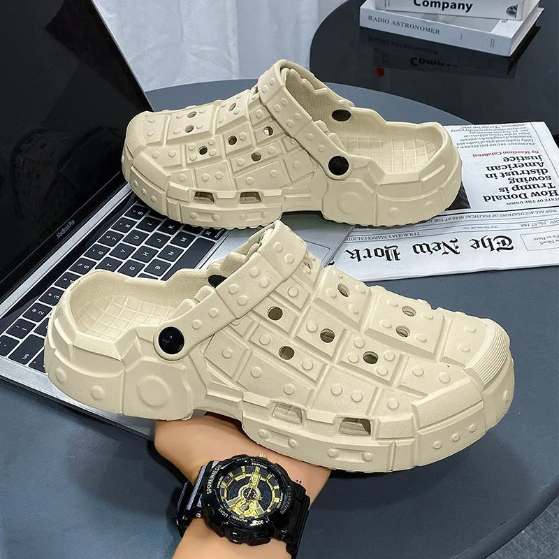 Men's sand coloured EVA hole shoes with thick sole and slip-on design.