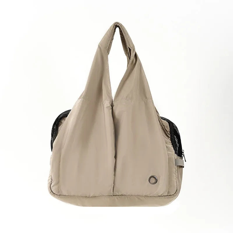 Apricot-coloured cloth pet handbag for small dogs and cats showing dimensions of 41cm by 16cm by 28cm
