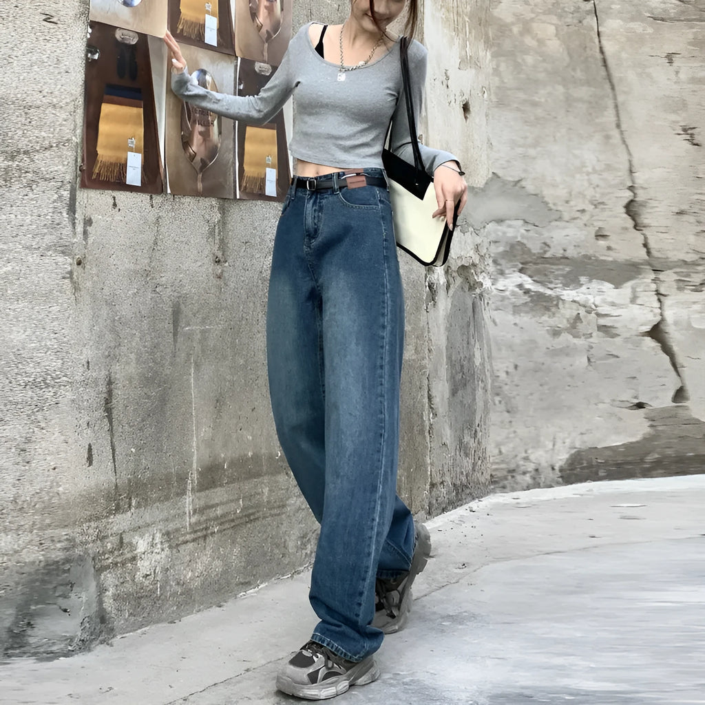 Women's retro blue straight leg jeans with a high waist, shown on a hanger.