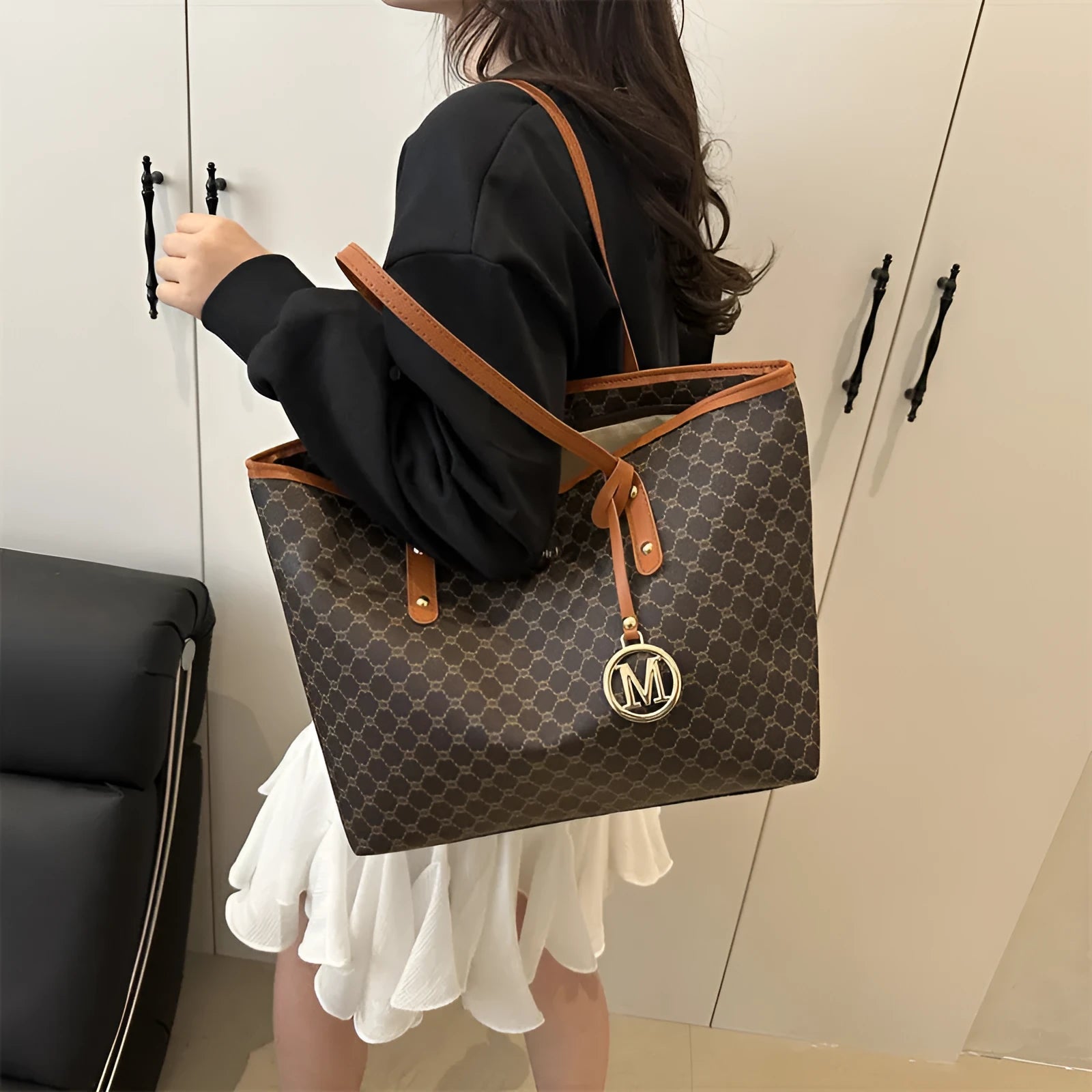 Black PU street style shoulder bag with visible stitching, shown next to grey, white, and brown colour options.