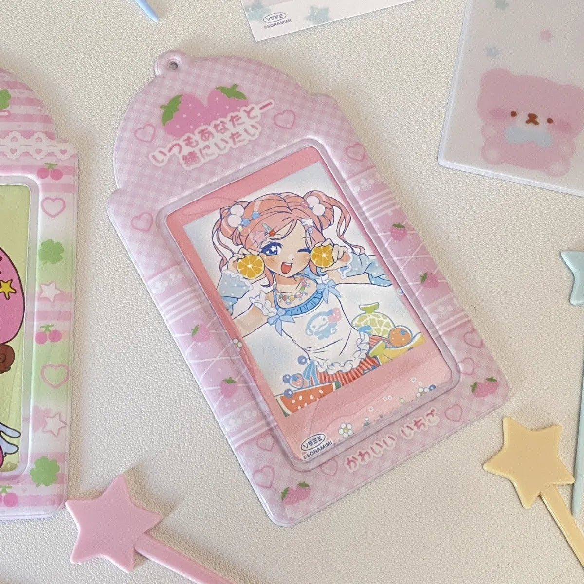 Cartoon strawberry or four-leaf clover PVC meal card holder measuring 7.6 x 13.6cm