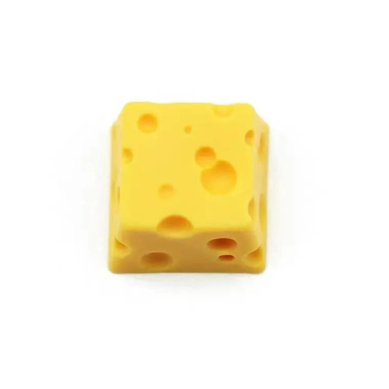 Yellow resin cheese wedge keycap for mechanical keyboards with MX stem mount.