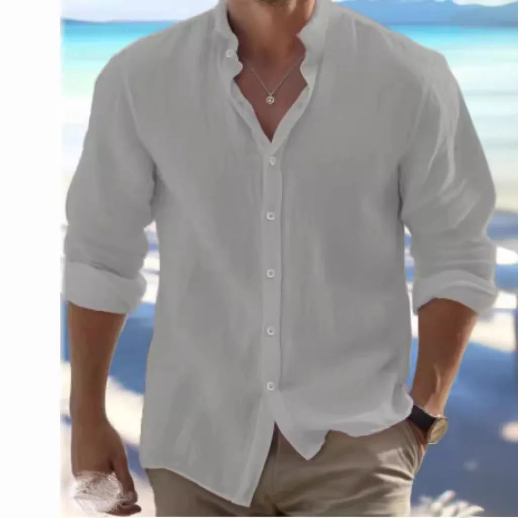 Man wearing a light grey long-staple cotton pullover summer shirt with casual stitching details.