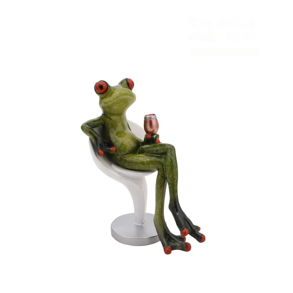 Synthetic resin pastoral style frog figurine home decoration ornament on a surface.