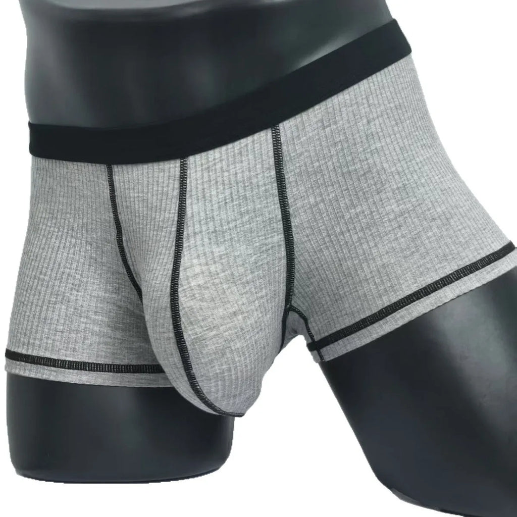 Men's solid colour breathable boxer shorts showing body shaping design in five colour options