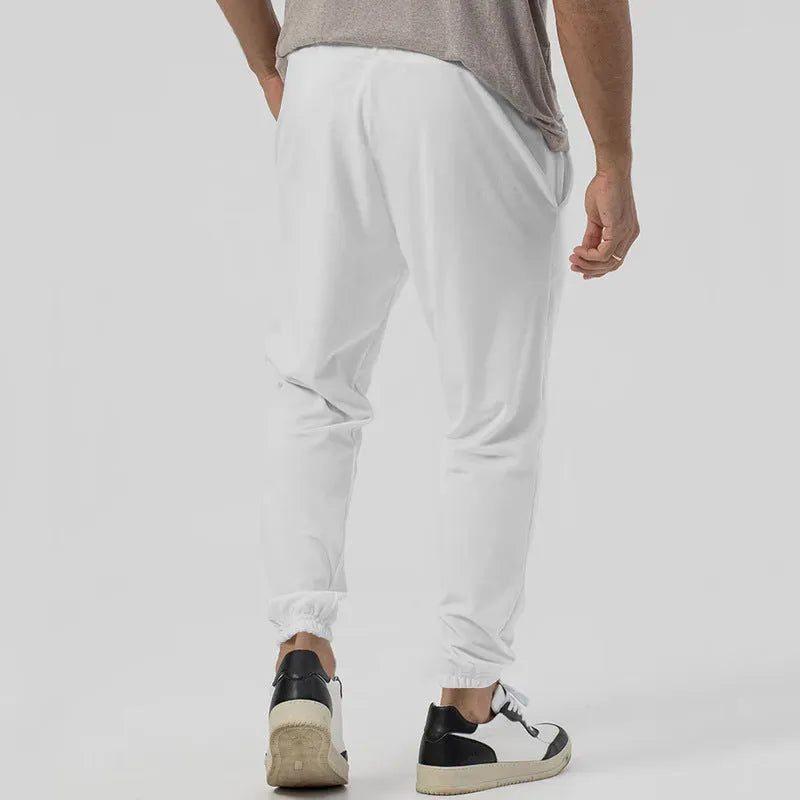 Men's straight-leg casual trousers in grey with tapered fit and elastic waistband