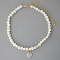 Round medal pearl necklace with geometric silver frame and adjustable chain
