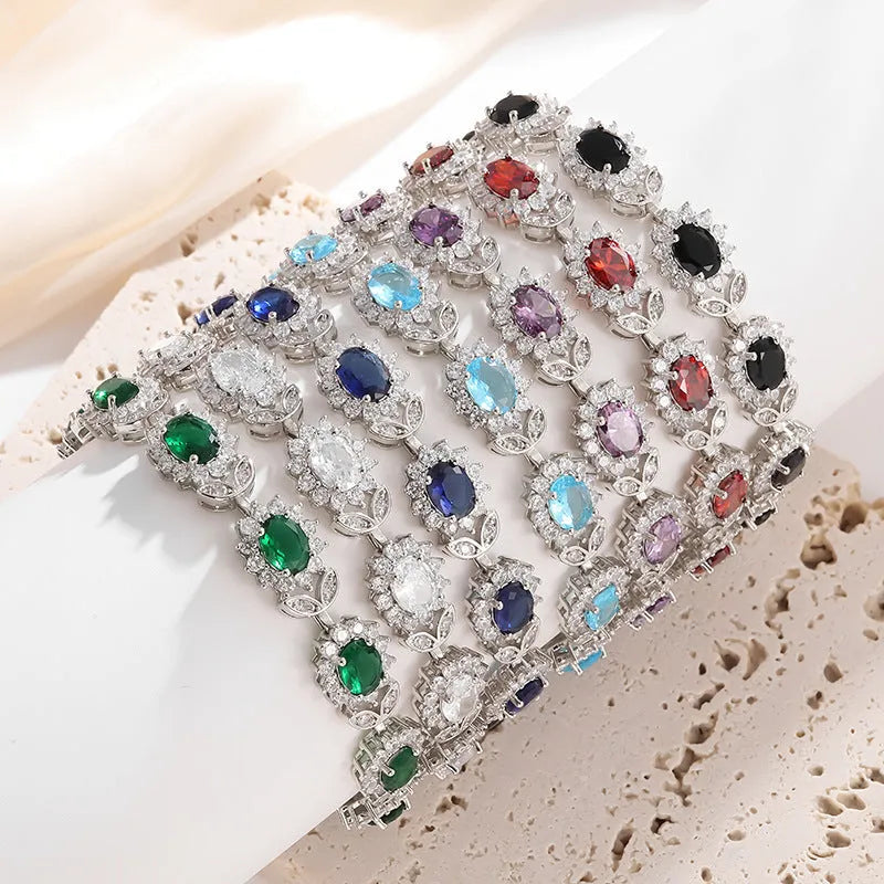 Simple inlaid zircon women's bracelet in environmentally friendly alloy showing gemstone colour variations