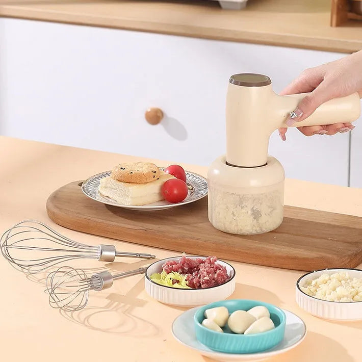 Beige yellow USB rechargeable electric garlic chopper with 250ml cup and 304 blade on a kitchen counter