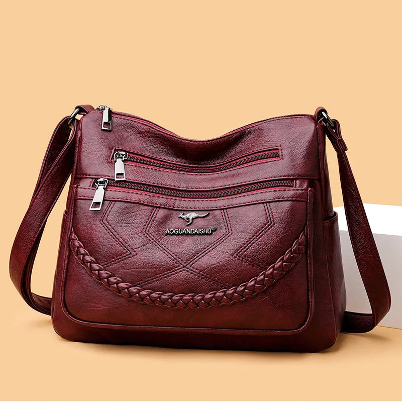 Soft PU leather shoulder bag with zippered compartments in horizontal square shape