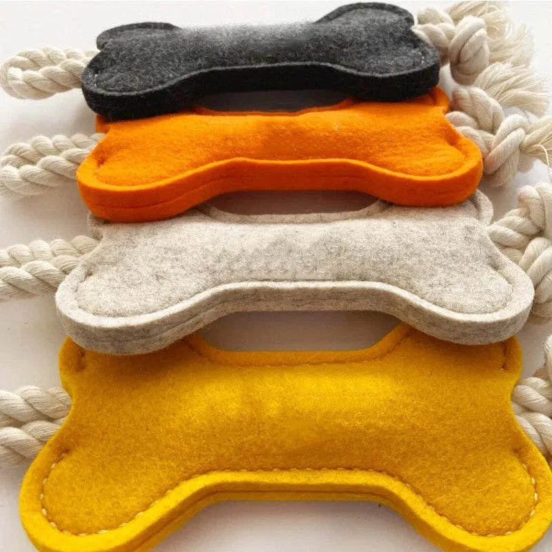 Bone-shaped dog chew toy with rope knot design in felt fabric, available in multiple colours