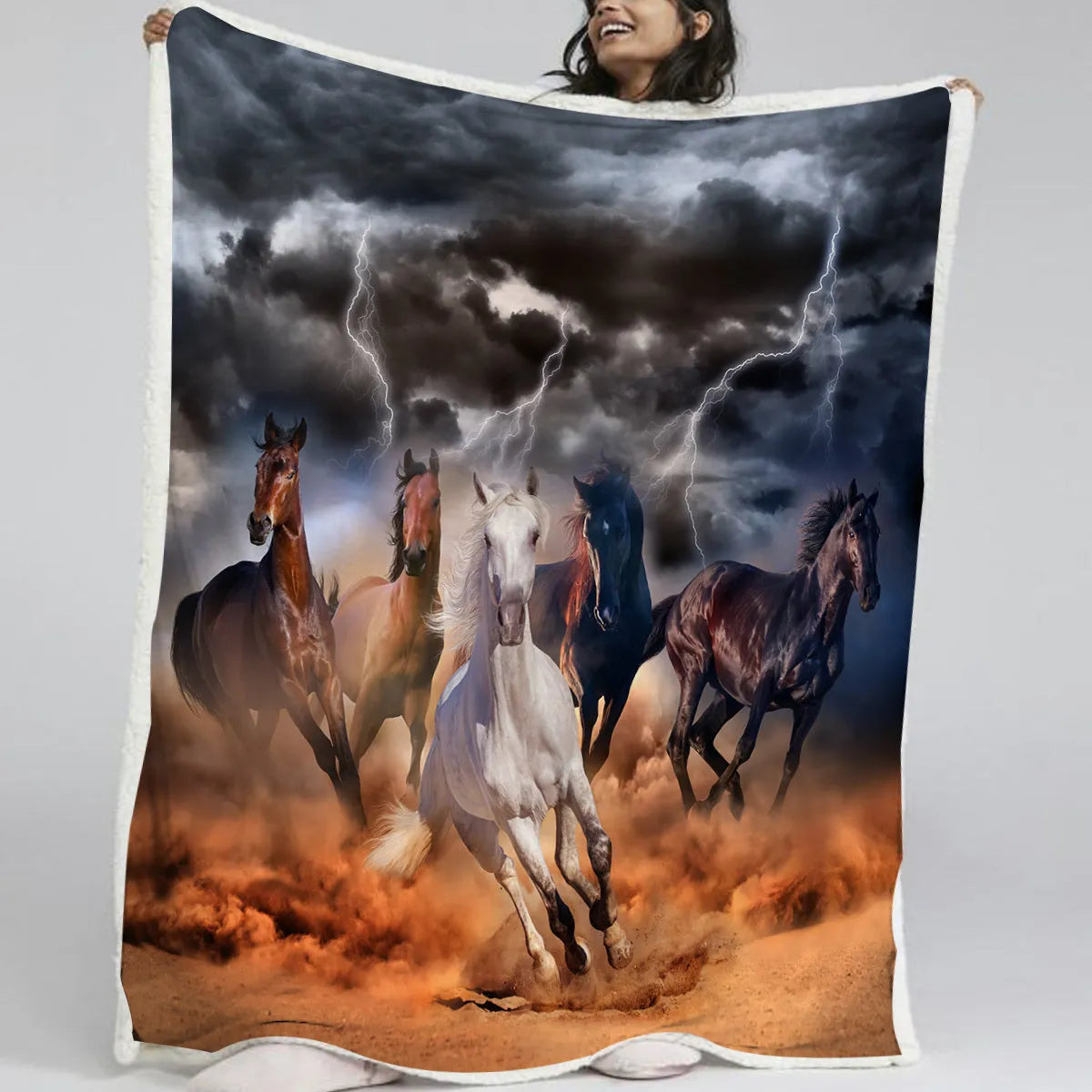 Horse themed lamb wool blanket in black, shown draped over a sofa, size 130x150cm