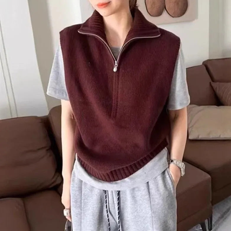 Retro half zip sleeveless knit vest in mesh polyester fabric showing 3D pattern detail