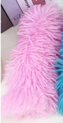 Plush cat toy pillow in blue, green, pink, or white colours measuring 27 by 10 centimetres