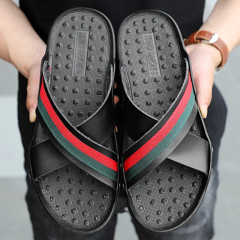 Men's white cowhide and PU non-slip flip-flops on a sandy beach background