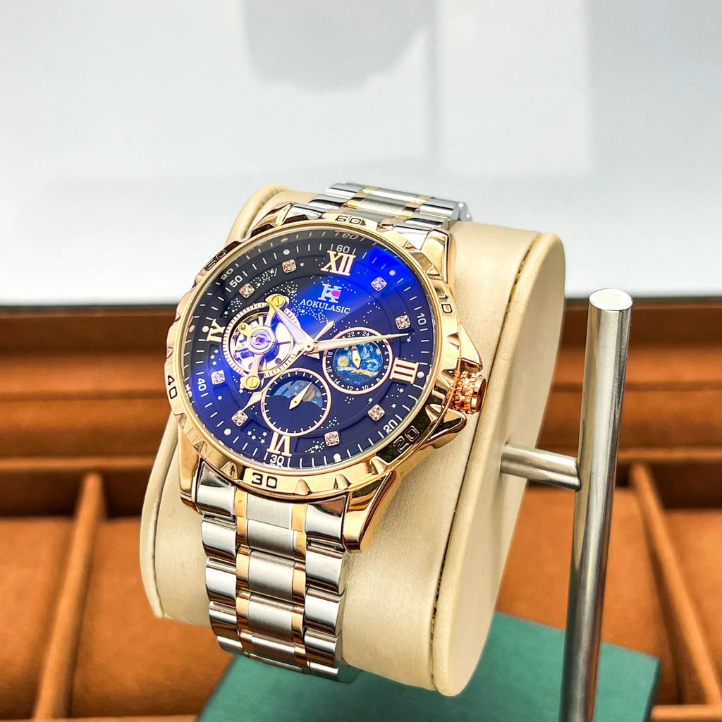 Automatic mechanical men's watch with large black dial and rose gold case, showing 12mm thickness.