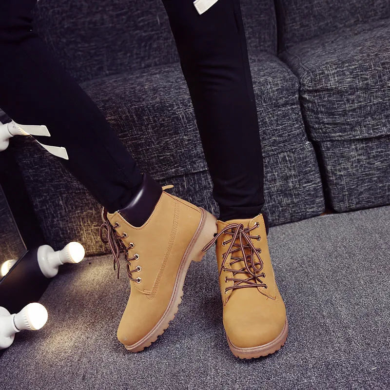 Men's pink high-top Martin boots with velvet lining, round toe, and flat lace-up front.