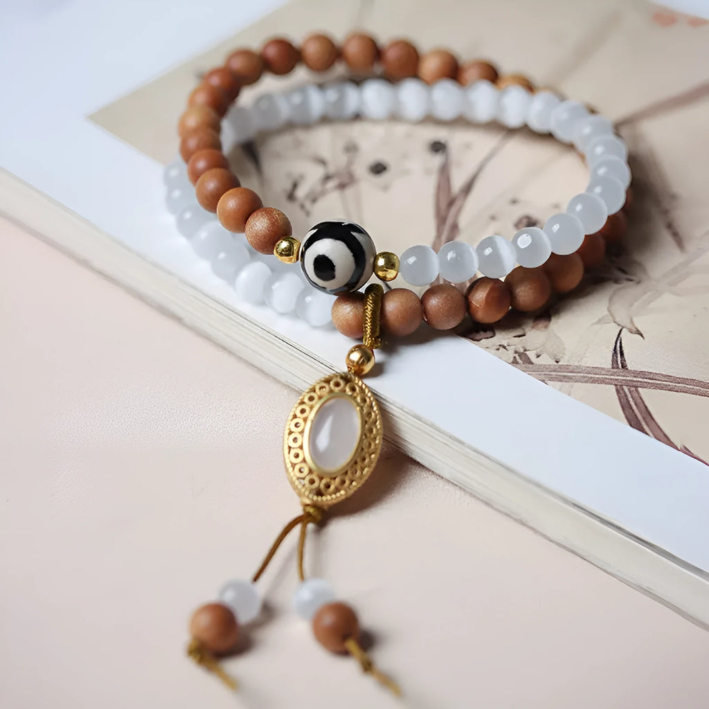 Sandalwood double ring bracelet with Opal Tibetan beads in mixed materials