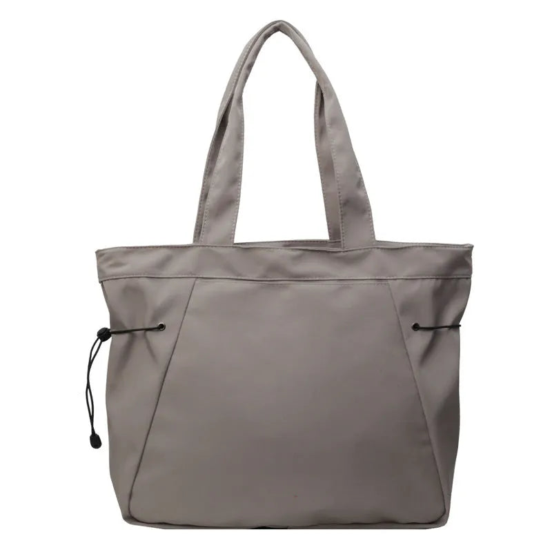 Soft Oxford cloth folding tote bag shown in multiple colours: black, brown, grey, and purple.