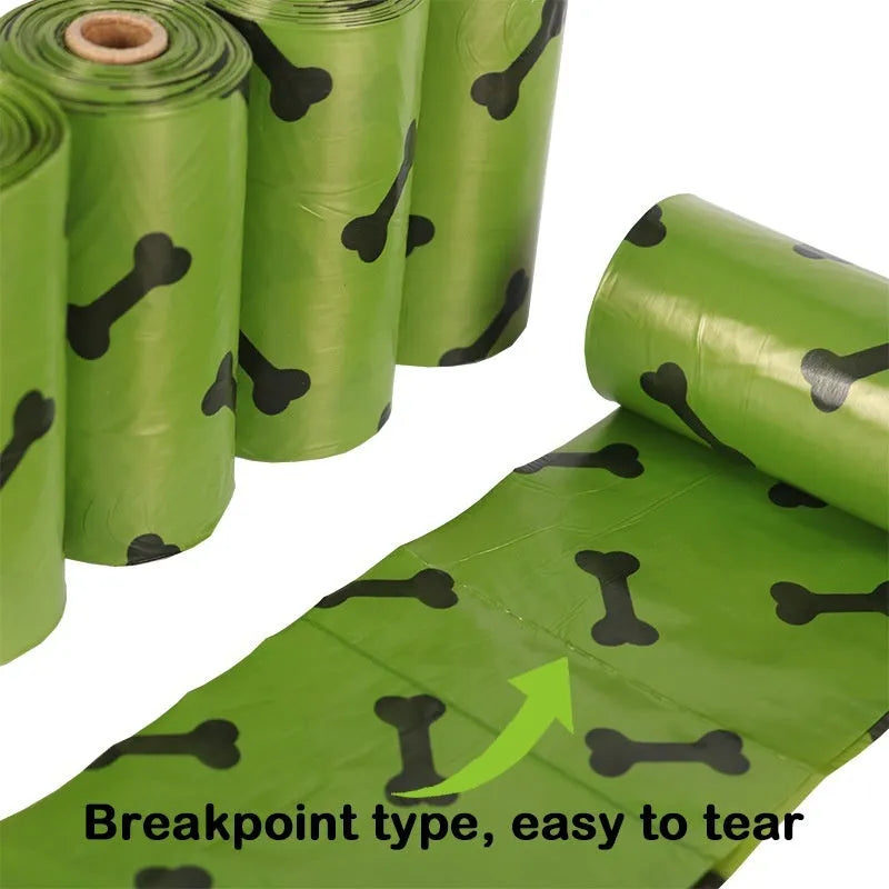 Military green degradable dog poop bags with black bone print measuring 23cm by 33cm