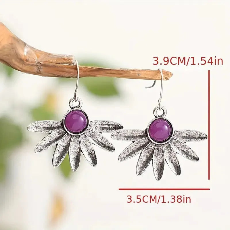 Purple Bohemian style earrings with animal zodiac design and floral elements
