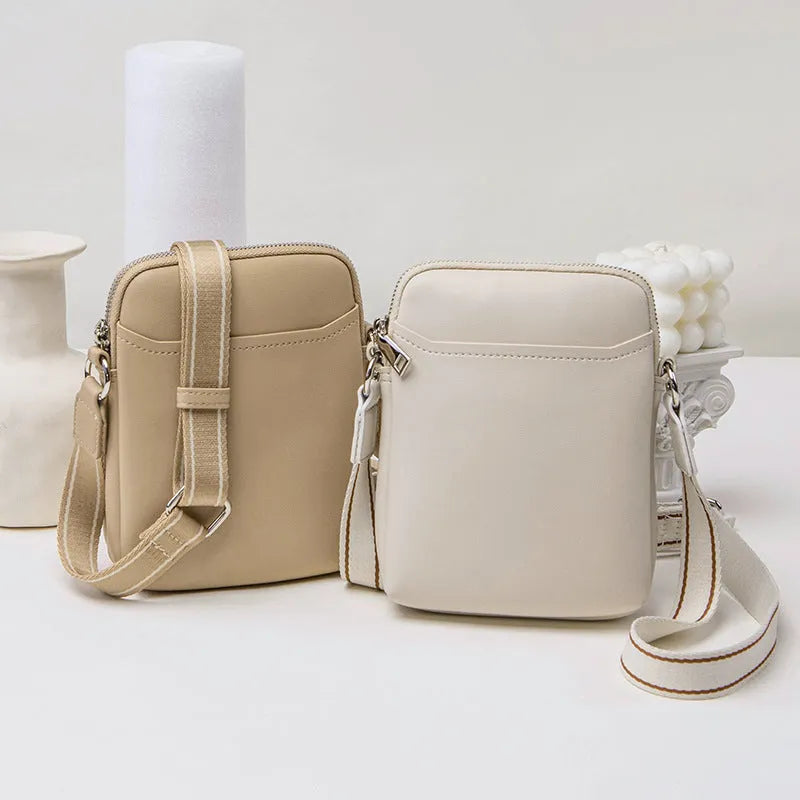 Small solid colour crossbody shoulder bag for women in PU material, shown in beige colour