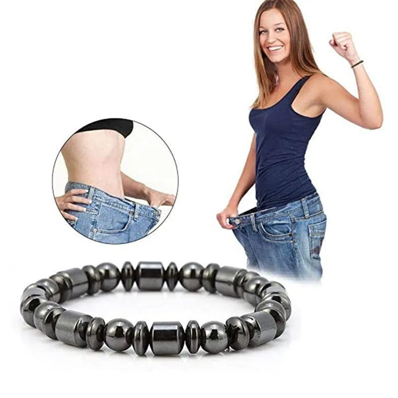 Black stretch bracelet with a pentagram stone, made from magnetite and hematite.