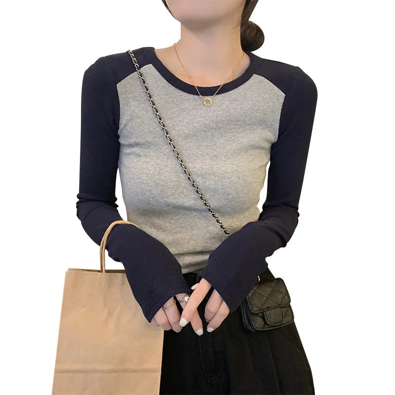 Women's dark blue oversized viscose top with princess sleeves and embroidery detailing.