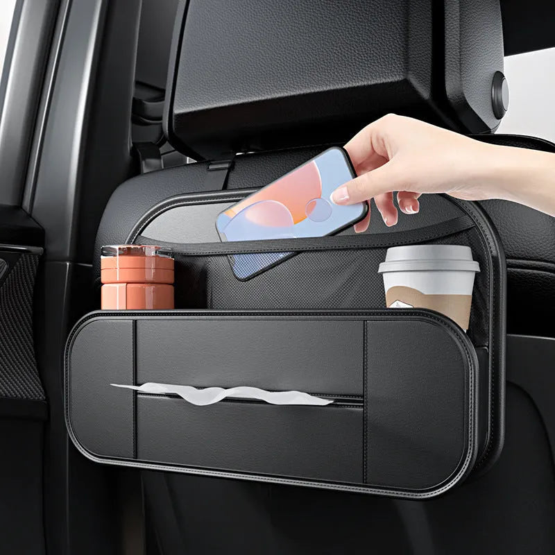 Black leather car seat rear storage bag with adjustable compartments mounted on vehicle seat